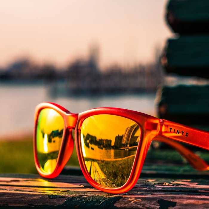Paradise Sunset by TINTS Eyewear . Orange Frame and Polarized Gold/Yellow Lens