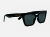 Luci Dash by TINTS Eyewear. Glossy black frame, black lenses