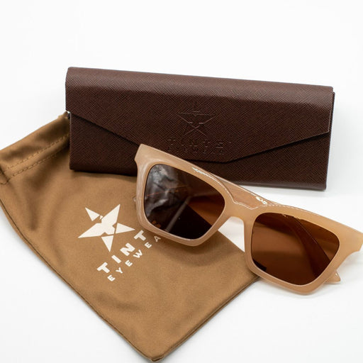 Glossy beige frame, brown Lenses. Pouch and case included