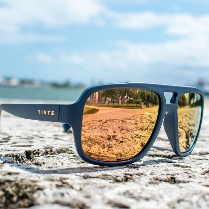 Sin City Durango by TINTS Eyewear . Blue Frame with Polarized Copper Mirrored Lens