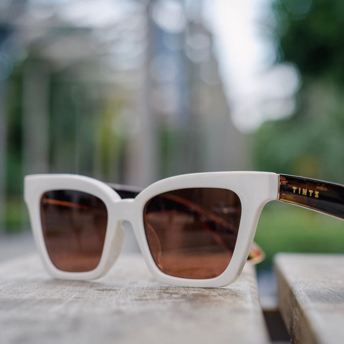 Luci Capri by TINTS Eyewear. Cream Front Frame, Tortoise Brown Arms